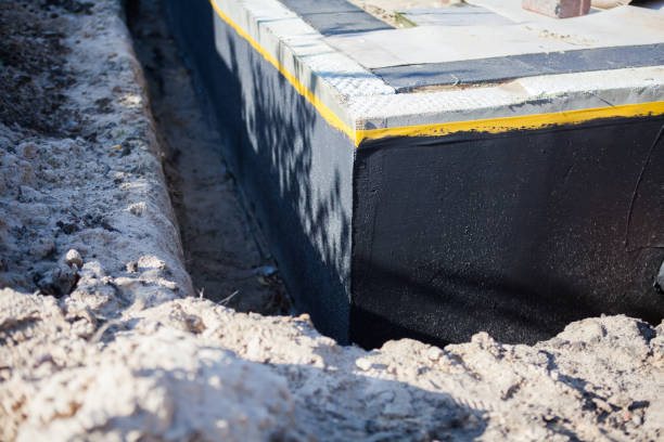 Professional Waterproofing technician working in Boggstown, IN
